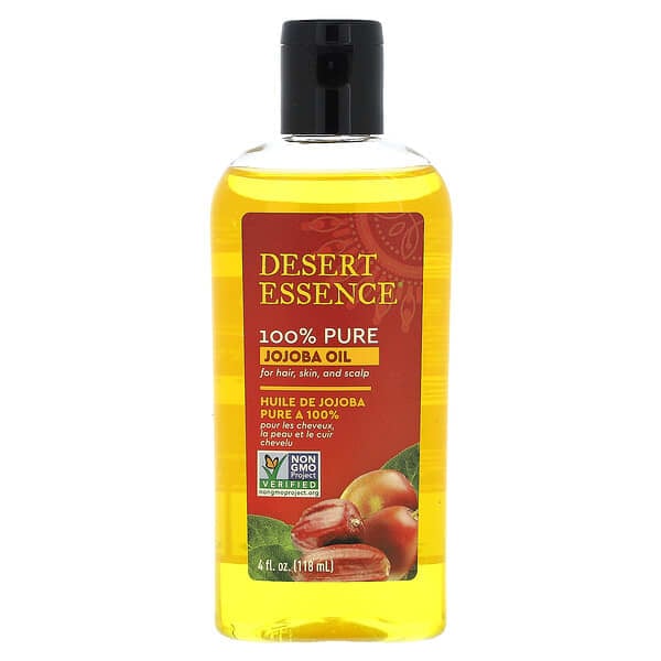Bottle of Desert Essence 100% Pure Jojoba Oil with a label showing the brand name, product name, and a picture of jojoba seeds.