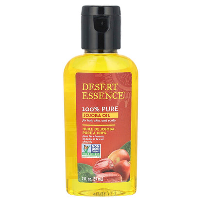 Bottle of Desert Essence 100% Pure Jojoba Oil with a label showing the brand name, product name, and a picture of jojoba seeds.